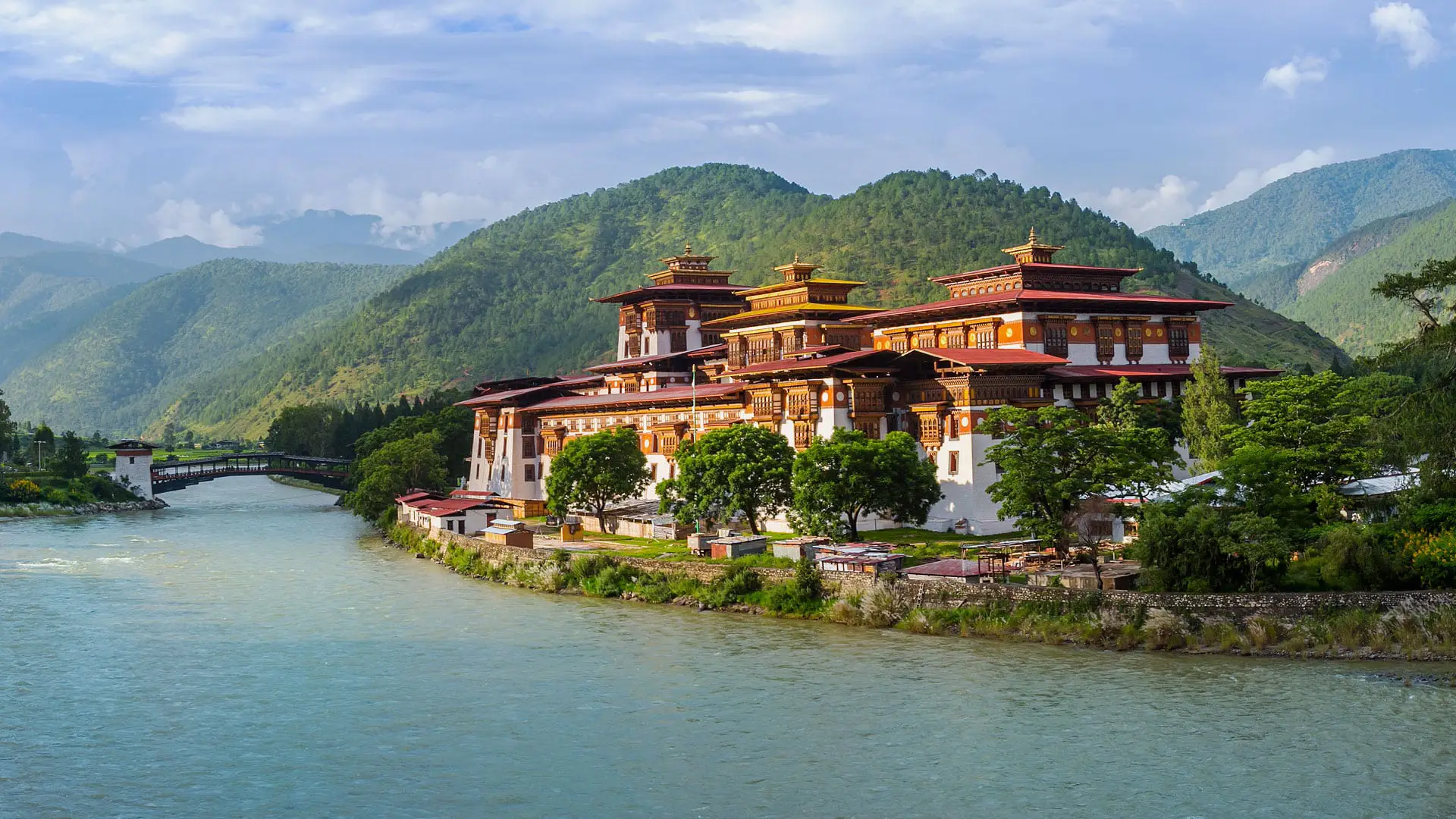 See the imposing Punakha Dzong, set alongside the river, Bhutan