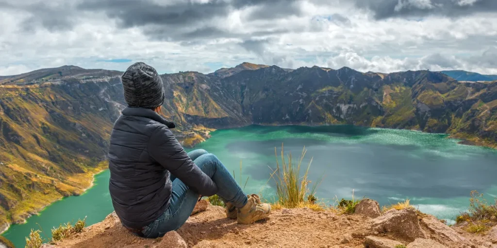 Woman taking in the views of Quilotoa Crater