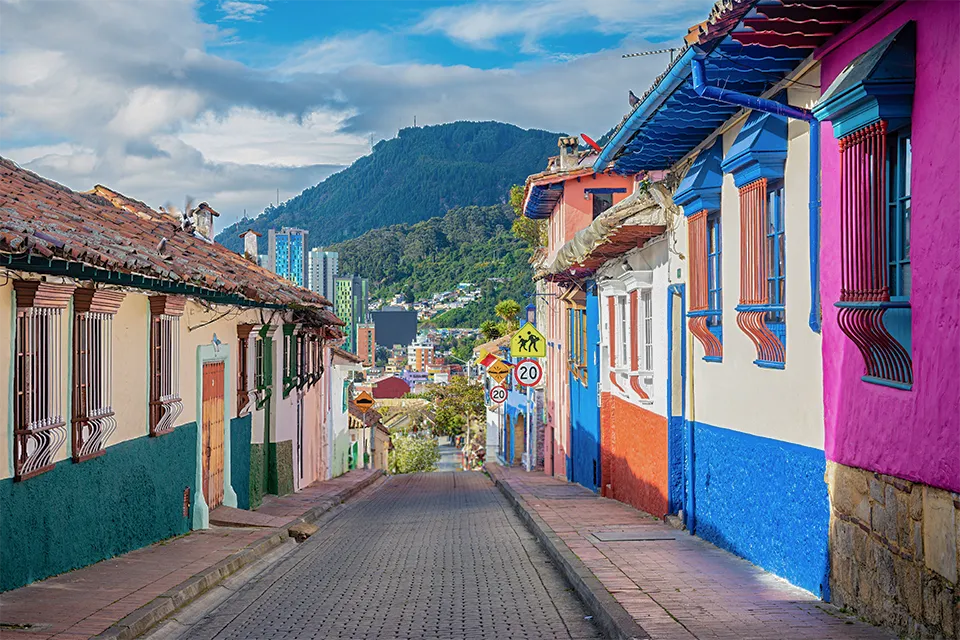 Explore colourful streets set against mountain backdrops in Bogota