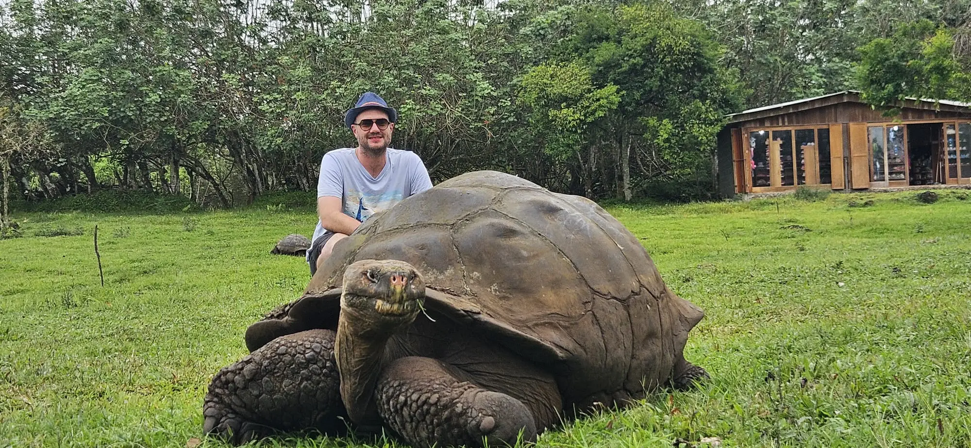 Our founder Sam, meeting the famous Galapagos Giant Tortoise
