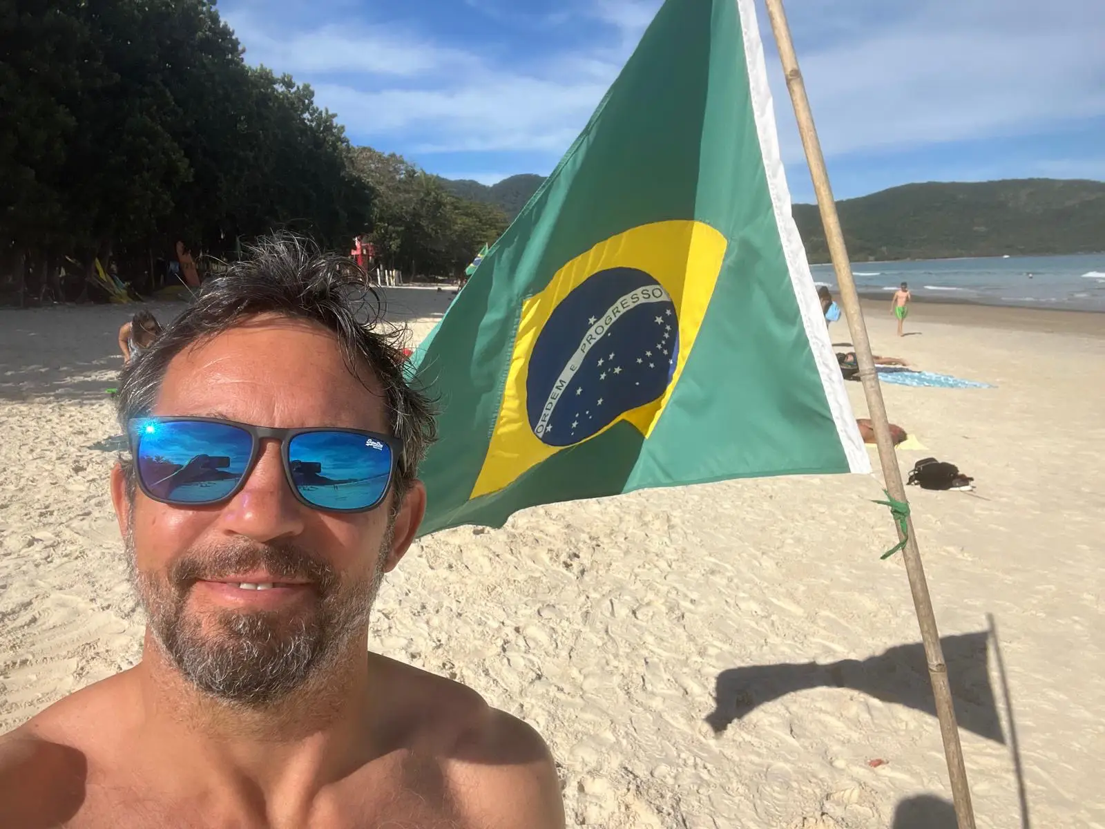 Travel Differently guests relaxing on one of the many beaches in Brazil