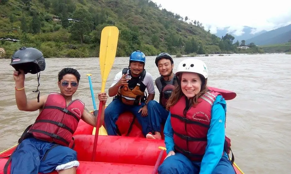 Our Bhutan expert Holly rafting the Punakha River in Bhutan